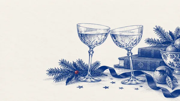 Cobalt illustration of two coupe glasses, evergreen branches, a red berry and scattered stars.